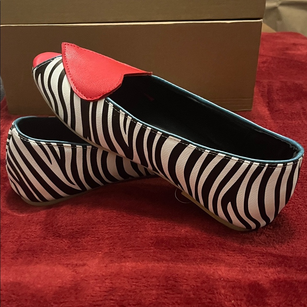Chic Zebra Print Flats with Bold Red Accent (wide)